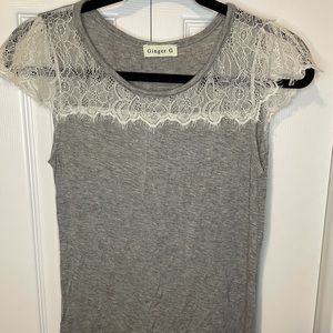 Grey top with white lace trim/sleeves.